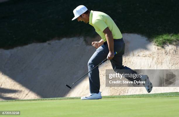 Kevin Chappell celebrates after putting in to win on the 18th green during the final round of the Valero Texas Open at TPC San Antonio AT&T Oaks...