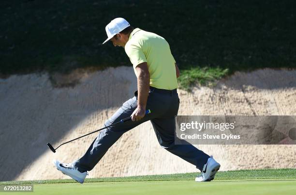 Kevin Chappell celebrates after putting in to win on the 18th green during the final round of the Valero Texas Open at TPC San Antonio AT&T Oaks...