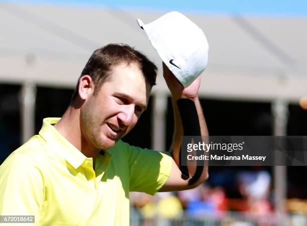 Kevin Chappell celebrates after putting in to win on the 18th green during the final round of the Valero Texas Open at TPC San Antonio AT&T Oaks...