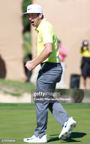 Kevin Chappell celebrates after putting in to win on the 18th green during the final round of the Valero Texas Open at TPC San Antonio AT&T Oaks...