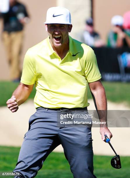 Kevin Chappell celebrates after putting in to win on the 18th green during the final round of the Valero Texas Open at TPC San Antonio AT&T Oaks...