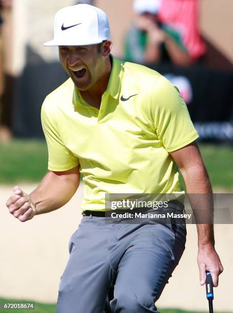 Kevin Chappell celebrates after putting in to win on the 18th green during the final round of the Valero Texas Open at TPC San Antonio AT&T Oaks...