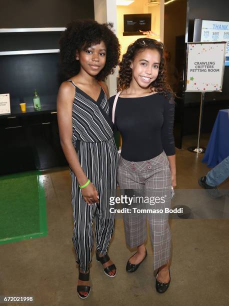 Actors Riele Downs and Asia Monet Ray attend Safe Kids Day 2017 at Smashbox Studios on April 23, 2017 in Culver City, California.
