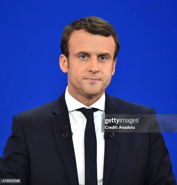 French centrist, independent candidate Emmanuel Macron addresses supporters after winning the lead percentage of votes with 24 percent in the first...