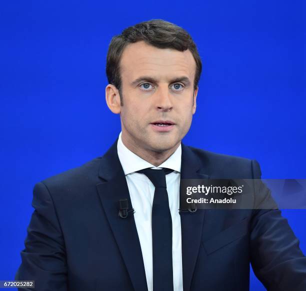 French centrist, independent candidate Emmanuel Macron addresses supporters after winning the lead percentage of votes with 24 percent in the first...