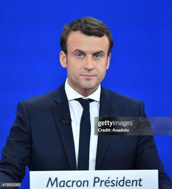 French centrist, independent candidate Emmanuel Macron addresses supporters after winning the lead percentage of votes with 24 percent in the first...