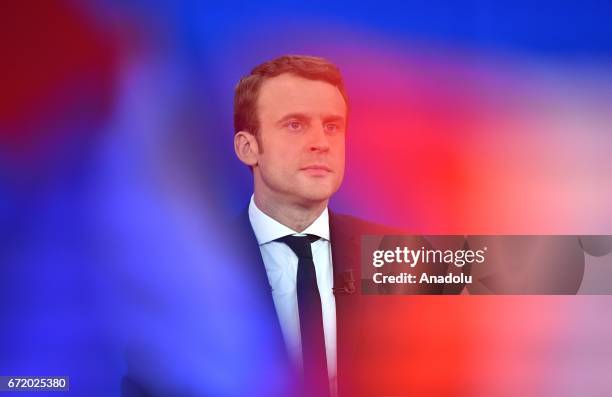 French centrist, independent candidate Emmanuel Macron addresses supporters after winning the lead percentage of votes with 24 percent in the first...