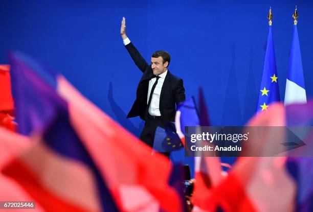 French centrist, independent candidate Emmanuel Macron addresses supporters after winning the lead percentage of votes with 24 percent in the first...