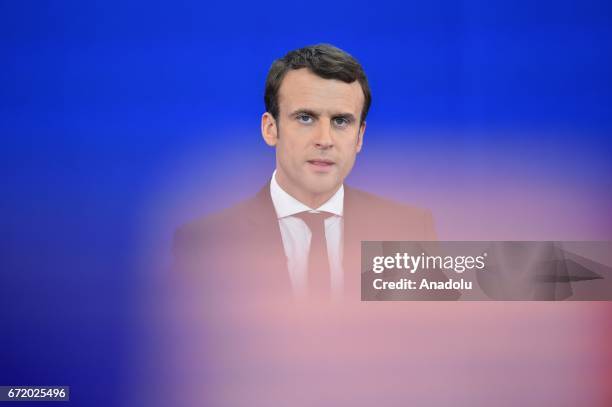 French centrist, independent candidate Emmanuel Macron addresses supporters after winning the lead percentage of votes with 24 percent in the first...