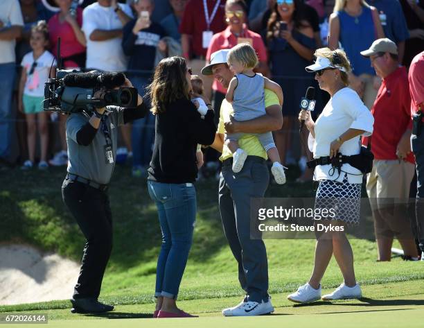 Kevin Chappell celebrates with his family; wife Elizabeth and children Wyatt and Collins, 3 months during the final round of the Valero Texas Open at...