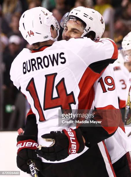 Alex Burrows of the Ottawa Senators and Derick Brassard celebrate after the Senators defeat the Boston Bruins 3-2 in overtime of Game Six of the...