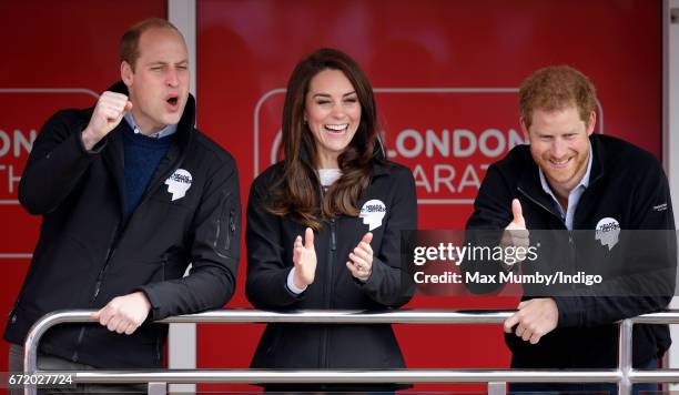 Prince William, Duke of Cambridge, Catherine, Duchess of Cambridge and Prince Harry cheer on runners as they start the 2017 Virgin Money London...