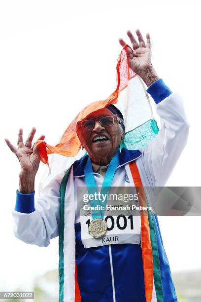 Man Kaur of India celebrates after receiving her gold medal at the World Masters Games on April 24, 2017 in Auckland, New Zealand. Kaur is the oldest...