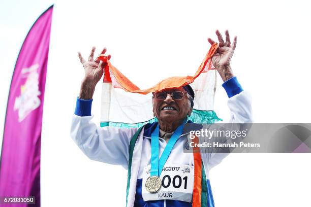 Man Kaur of India celebrates after receiving her gold medal at the World Masters Games on April 24, 2017 in Auckland, New Zealand. Kaur is the oldest...