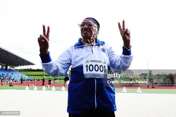 Man Kaur of India celebrates after competing in the 85-year-olds age group 100m sprint at the World Masters Games on April 24, 2017 in Auckland, New...