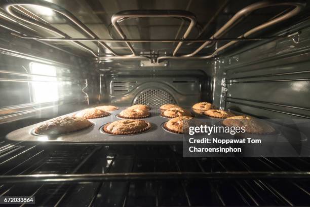 homemade baking, bangkok, thailand - inside of oven stock pictures, royalty-free photos & images