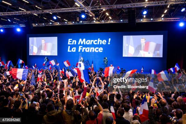 Emmanuel Macron, France's independent presidential candidate, speaks to attendees after the first round of the French presidential election are...