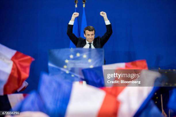 Emmanuel Macron, France's independent presidential candidate, gestures while speaking with attendees after the first round of the French presidential...