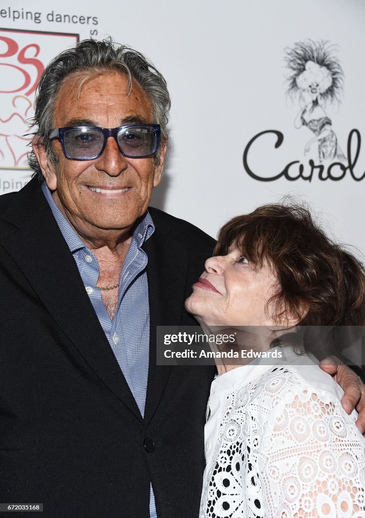 Actor Charlie Brill and actress Mitzi McCall arrive at the 30th