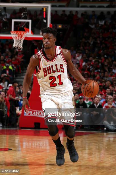 Jimmy Butler of the Chicago Bulls handles the ball during the game against the Boston Celtics in Game Four during the Eastern Quarterfinals of the...