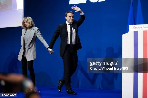 Founder and Leader of the political movement 'En Marche !' and presidential candidate Emmanuel Macron , with his wife Brigitte Trogneux , addresses...