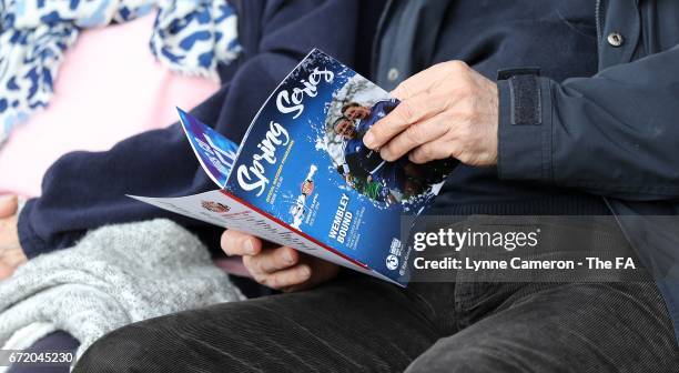 Birmingham City fans read the programme during the match between Birmingham City and Sunderland Ladies in The WSL Spring Series at The Automated...