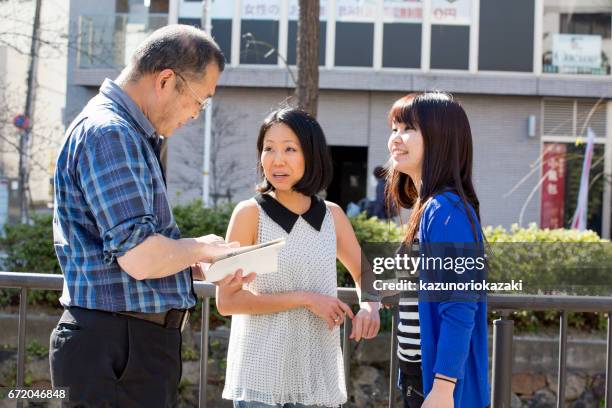 a man asks a course - 大人 stock pictures, royalty-free photos & images