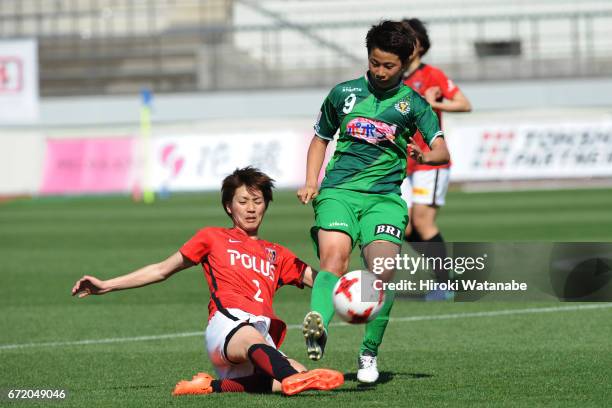Kana Osafune of Urawa Red Diamonds Ladies and Mina Tanaka of NTV Beleza compete for the ball during the Nadeshiko League match between Diamonds...