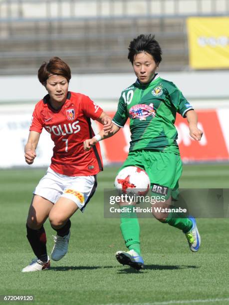 Risa Ikadai of Urawa Red Diamonds Ladies and Yuka Momiki of NTV Beleza compete for the ball during the Nadeshiko League match between Diamonds Ladies...