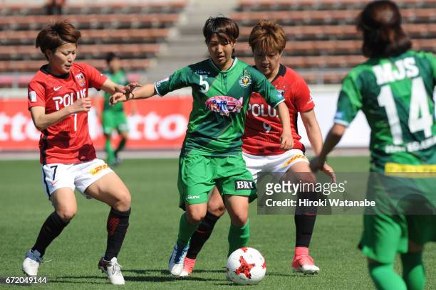Risa Ikadai of Urawa Red Diamonds Ladies and Rin Sumida of NTV Beleza compete for the ball during the Nadeshiko League match between Diamonds Ladies...
