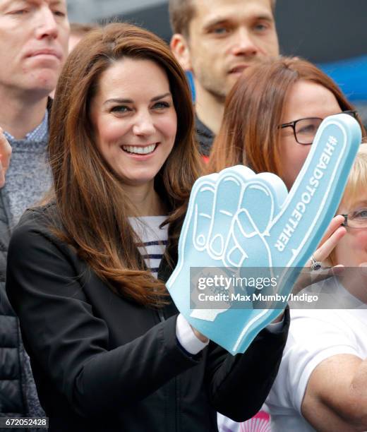 Catherine, Duchess of Cambridge cheers on runners talking part in the 2017 Virgin Money London Marathon on April 23, 2017 in London, England. The...