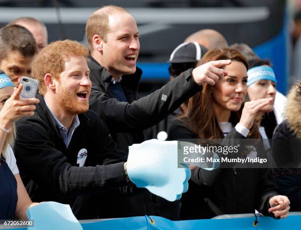 Prince Harry , Prince William, Duke of Cambridge and Catherine, Duchess of Cambridge cheer on runners talking part in the 2017 Virgin Money London...
