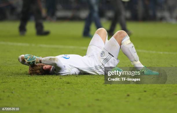 Goalkeeper Ralf Faehrmann of Schalke looks dejected after the UEFA Europa League quarter final second leg match between FC Schalke 04 and Ajax...