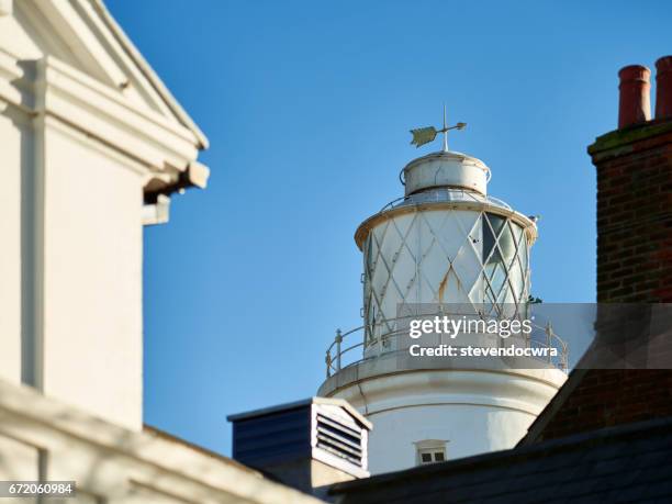 southwold lighthouse on the suffolk heritage coast - southwold stockfoto's en -beelden