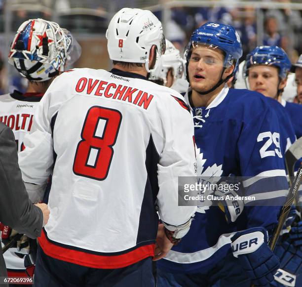 Alex Ovechkin of the Washington Capitals receives congratulations from William Nylander of the Toronto Maple Leafs after Game Six of the Eastern...