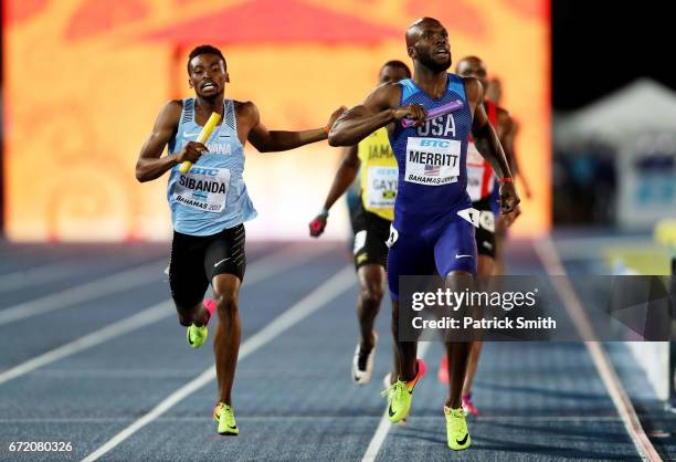 LaShawn Merritt of the USA and Karabo Sibanda of Botswana run to the finishline in the Men's 4x400 Metres Relay Final during the IAAF/BTC World...