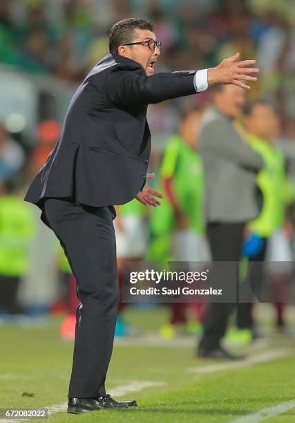 Jose Manuel de la Torre, coach of Santos gives instructions to his players during the match between Santos Laguna and America as part of the Torneo...