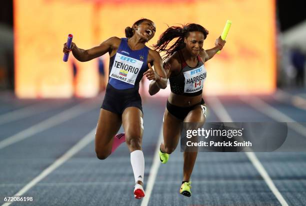 Angela Tenorio of Ecuador and Shaina Harrison of Canada cross the finishline in the Women's 4x100 Metres Relay B Final during the IAAF/BTC World...