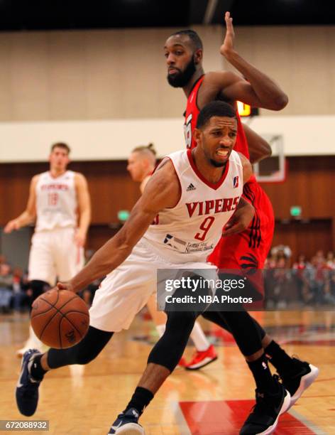 McAllen, TX Darrius Morris of the Rio Grande Valley Vipers moves around C.J. Leslie of the Raptors 905 during the first game of the NBA D-League...