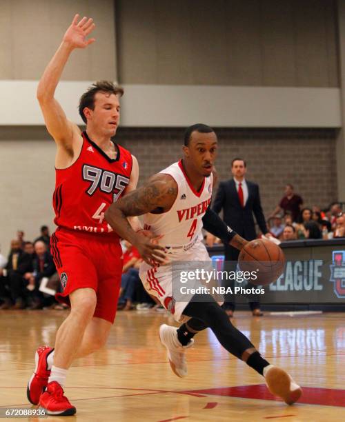 McAllen, TX Jarvis Threatt of the Rio Grande Valley Vipers moves around Brady Heslip of the Raptors 905 during the first game of the NBA D-League...