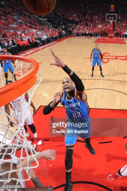 Taj Gibson of the Oklahoma City Thunder shoots the ball against the Houston Rockets during Game Two of the Eastern Conference Quarterfinals of the...