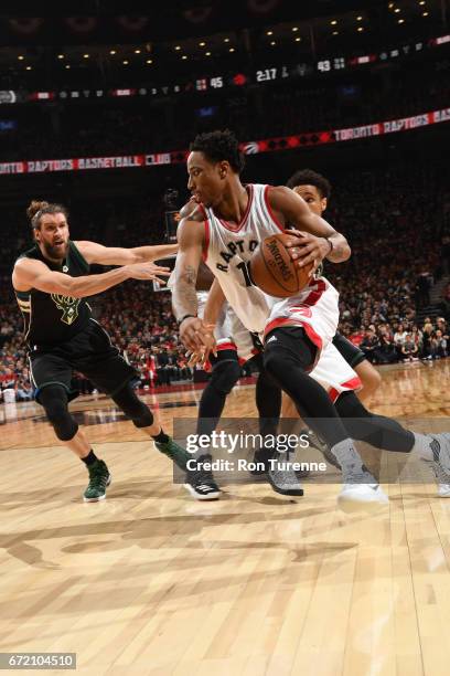 DeMar DeRozan of the Toronto Raptors handles the ball against the Milwaukee Bucks in Round One of the Eastern Conference Playoffs during the 2017 NBA...