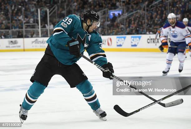 Logan Couture of the San Jose Sharks shoots on goal against the Edmonton Oilers during the second period in Game Four of the Western Conference First...