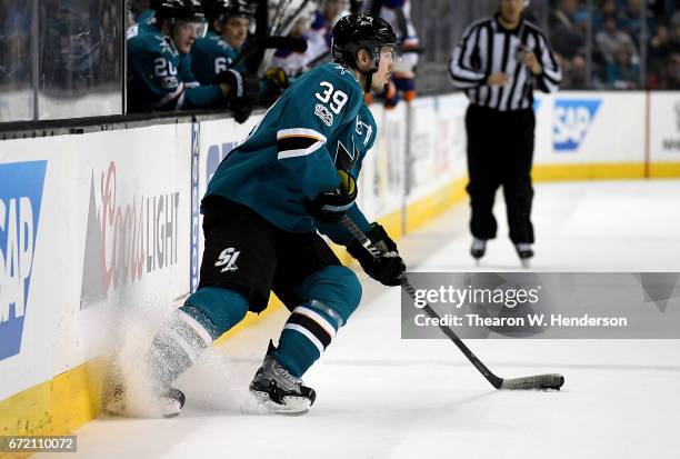 Logan Couture of the San Jose Sharks skate with control of the puck against the Edmonton Oilers during the second period in Game Four of the Western...