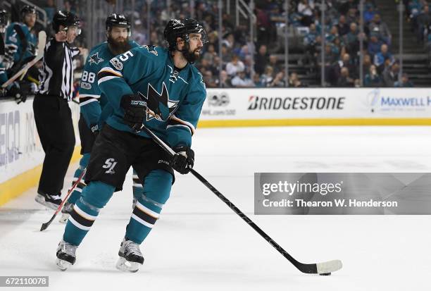 David Schlemko of the San Jose Sharks skates with control of the puck against the Edmonton Oilers during the second period in Game Four of the...