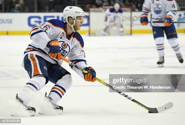 Drake Caggiula of the Edmonton Oilers skates with control of the puck against the San Jose Sharks during the third period in Game Four of the Western...