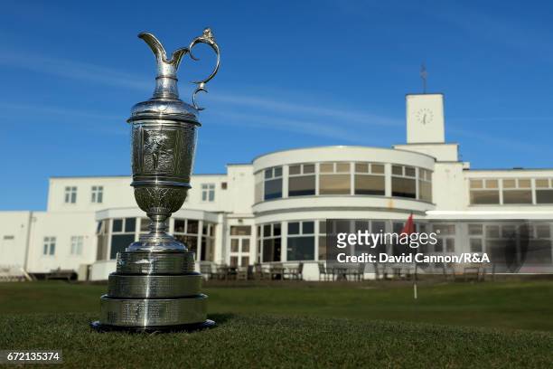 The Claret Jug, the Open Championship trophy, in front of the 18th green with the clubhouse behind at Royal Birkdale Golf Club, the host course for...