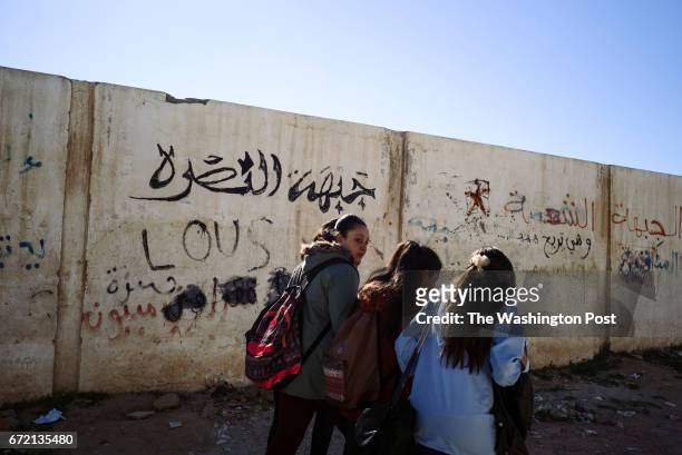 March 18th Kasserine, Tunisia: A writing on a wall of a local school reads "Jabat al Nusra". Kasserine is an impoverished city in western Tunisia....