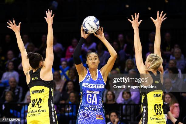 Maria Tutaia of the Mystics looks to beat the defence of Whitney Souness and Katrina Grant of the Pulse during the New Zealand Premiership match...