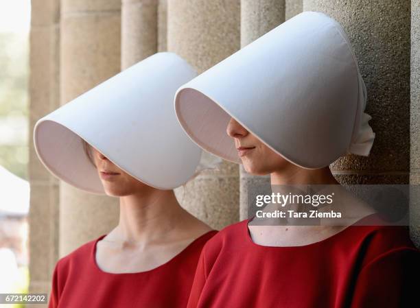 Based on the book by Margaret Atwood, performers pose as Handmaids to promote the new tv series 'The Handmaid's Tale' at the Los Angeles Times...